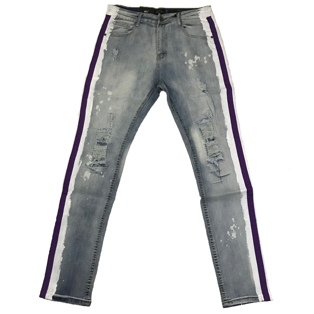 Men’s purple and paint striped jeans.